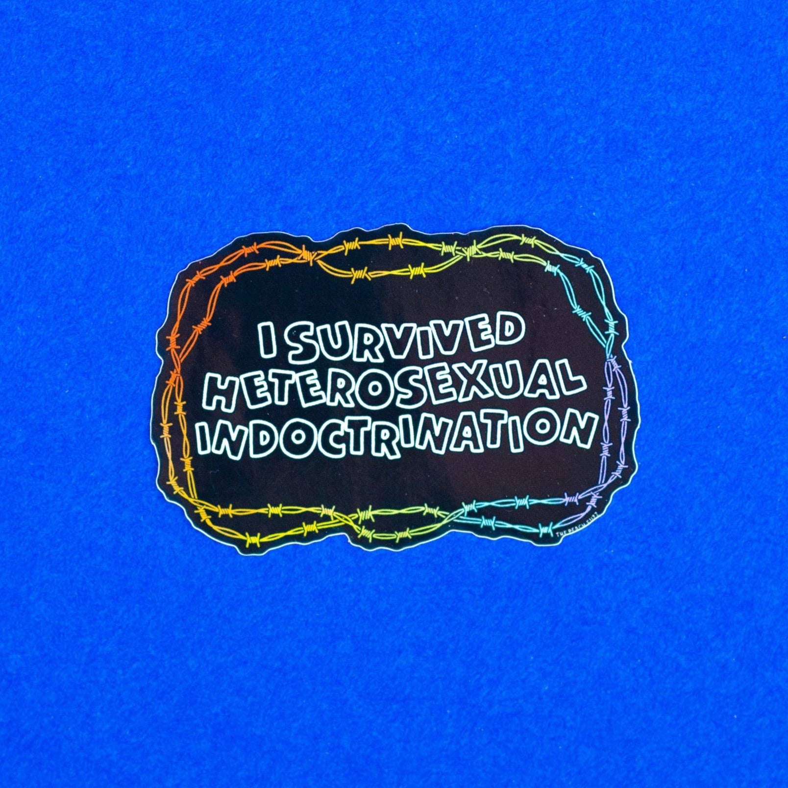 I Survived Heterosexual Indoctrination Sticker by The Peach Fuzz Co.