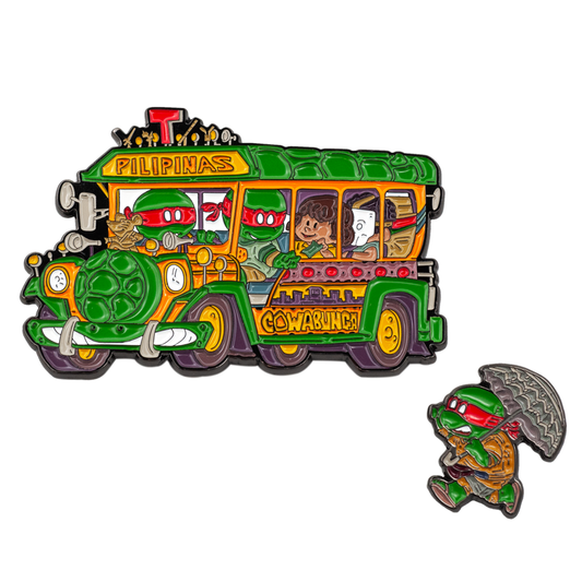 Colorful jeepney-shaped enamel pin with 'Filipinas' text and a smaller turtle-shaped pin below on a white background.